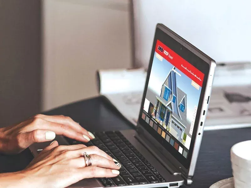 Person using IKO's ROOFViewer tool on their laptop